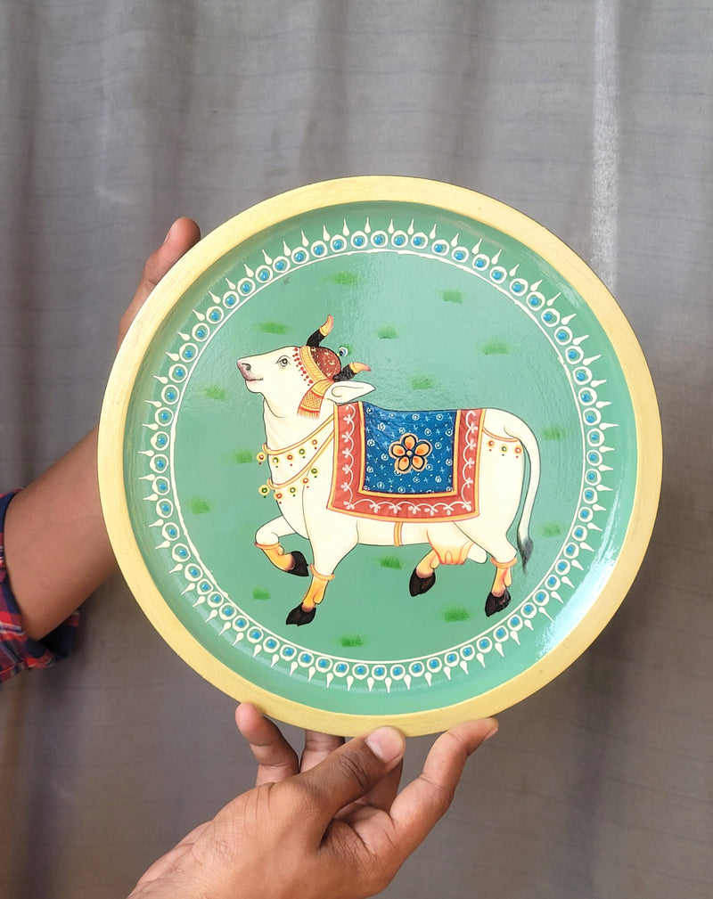 Wooden Pichwai Painting Wall Plate Hand Painted Cow 10 Inch Design 4 Solid Wood Indian Handicrafts (10H x 10L x 1W Inches)