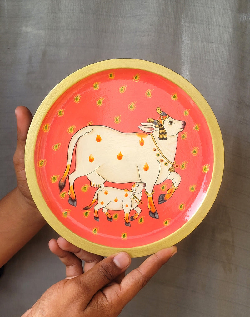 Wooden Pichwai Painting Wall Plate Hand Painted Cow and Calf 8 Inch Design 7 Solid Wood Indian Handicrafts (8H x 8L x 1W Inches)