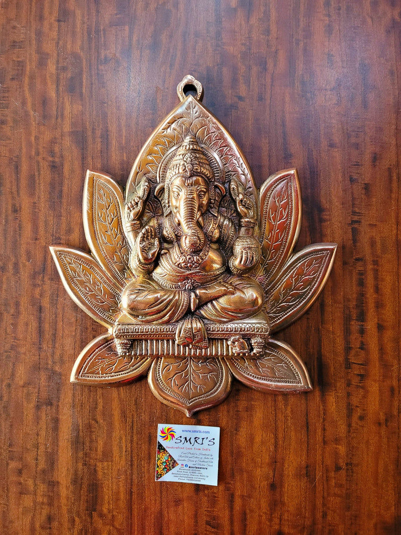 Ganesha on Flower wall decor (10L * 1W * 12H ) inches copper coated aluminum idol wall decor pooja decor