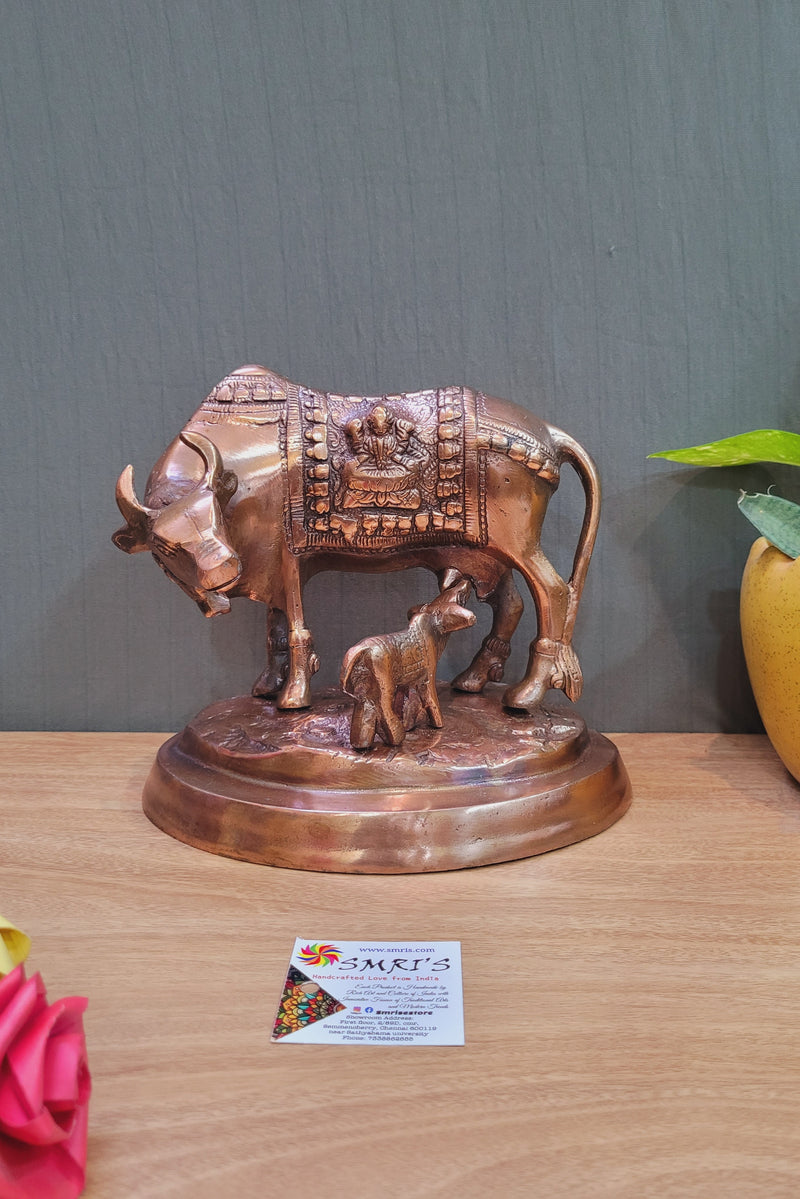 Gomatha Gomata Kamdhenu Cow & Calf solid statue (7.5H * 8L* 6W) inches Copper coated Aluminium Idol Table Decor Pooja Decor Vastu decor Hindu