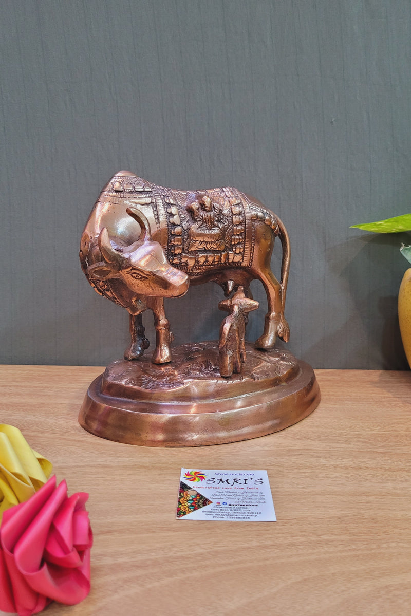 Gomatha Gomata Kamdhenu Cow & Calf solid statue (7.5H * 8L* 6W) inches Copper coated Aluminium Idol Table Decor Pooja Decor Vastu decor Hindu