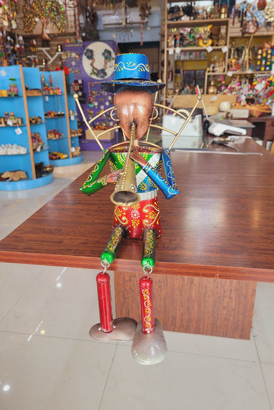 Musician Man with Trumpet Blue Cap with swinging legs Table Decor Iron (7L * 7W * 17H) inches Showpiece Return Gift Corporate Gift Showpiece Return Gift Corporate Gift